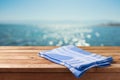 Empty wooden table over sea beach bokeh background. Summer picnic on beach background Royalty Free Stock Photo