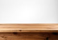Empty wooden table over white wall background, product display montage. Royalty Free Stock Photo
