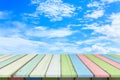 Empty wooden table or plank with blue sky and cloud background. Royalty Free Stock Photo