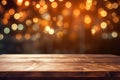 Empty wooden table platform and blurred background bokeh of at bar restaurant at night