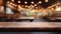 Empty wooden table platform and blurred background bokeh of at bar restaurant at night