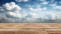 Empty wooden table top with cloudy sky background Royalty Free Stock Photo