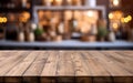 Empty wooden table for product placement or montage with kitchen bokeh background. Royalty Free Stock Photo