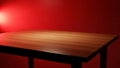 Empty wooden table with red background and warm lighting Royalty Free Stock Photo