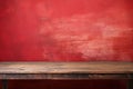 empty wooden table with red grunge wall in the background Royalty Free Stock Photo