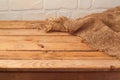 Empty wooden table with sackcloth. Kitchen background Royalty Free Stock Photo