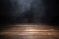 Empty wooden table with smoke on dark background Royalty Free Stock Photo