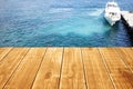 Empty wooden table or terrace on the sea background. Ship berth on the shore. Can be used as a table, pier, terrace. Royalty Free Stock Photo