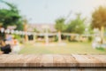 Empty wooden table top and Abstract blurred light bokeh and blur background of garden trees in sunlight. product display template Royalty Free Stock Photo