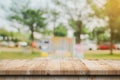 Empty wooden table top and Abstract blurred light bokeh and blur background of garden trees in sunlight. product display template Royalty Free Stock Photo