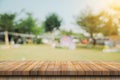 Empty wooden table top and Abstract blurred light bokeh and blur background of garden trees in sunlight. product display template Royalty Free Stock Photo