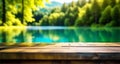 The empty wooden table top with blur background of lake and green forest. Royalty Free Stock Photo