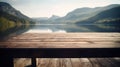 The empty wooden table top with blur background of summer lakes mountain. Exuberant image Royalty Free Stock Photo