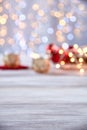 Empty table top with blur christmas lights background Royalty Free Stock Photo