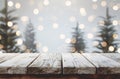 Empty wooden table top with blurred background of white and grey colors Royalty Free Stock Photo