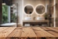 Empty wooden table top and blurred bathroom interior on the background. Copy space for your object, product, cosmetic Royalty Free Stock Photo