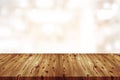 Empty wooden table top with blurred of bokeh coffee shop, cafe, bar background, Abstract background can be used for display or Royalty Free Stock Photo