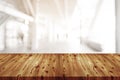 Empty wooden table top with blurred of coffee shop, cafe, bar background, Abstract background can be used for display or montage Royalty Free Stock Photo