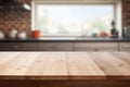 Empty wooden table top and blurred kitchen interior on the background. Copy space for your object, product, food Royalty Free Stock Photo