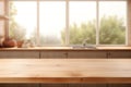 Empty wooden table top and blurred kitchen interior on the background. Copy space for your object, product, food Royalty Free Stock Photo