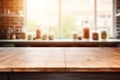 Empty wooden table top and blurred kitchen interior on the background. Copy space for your object, product, food Royalty Free Stock Photo