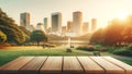 empty wooden table top foregrounding a softly blurred background of a city and park
