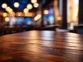 Empty wooden table top with lights bokeh on blur restaurant background. Royalty Free Stock Photo