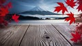 Empty wooden table top with Mountain Fuji with morning fog and red leaves background blurred