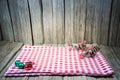 Empty wooden table top with red chess napery Ready for product display montage.. Royalty Free Stock Photo