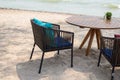 Wooden table with two chairs at beach restaurant Royalty Free Stock Photo