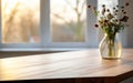 Empty wooden table and vase with dry flowers on windowsill background Royalty Free Stock Photo