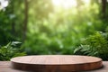 Empty Wooden Tabletop Podium in Garden Open Forest with Blurred Green Plants Background for Organic Product Presentation Royalty Free Stock Photo