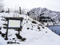 Empty wooden tourist information sign in winter, Norway, Vik Kommune Royalty Free Stock Photo