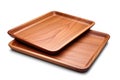 Empty wooden trays isolated from white background