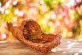 Empty woven basket on the wooden table Royalty Free Stock Photo