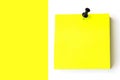 Empty Yellow Post It With Black Pin on White Yellow Background. Blank yellow sticky note Royalty Free Stock Photo