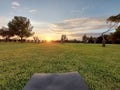 Empty yoga mat at sunset in a park. Ready for yoga exercise concept. Royalty Free Stock Photo