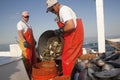 Emptying crabs into a crab pot