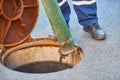 Emptying septic tank, cleaning the sewers. Royalty Free Stock Photo