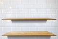 EmptyTwo layers wood plank shelf and at white ceramic tile wall pattern background. Mock up for display or montage of product or Royalty Free Stock Photo