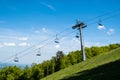 Emtpy chairlift in ski resort in summer Royalty Free Stock Photo