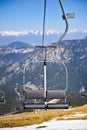 Emtpy chairlift in a Ski Resort on sunny summer day Royalty Free Stock Photo