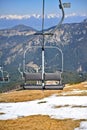 Emtpy chairlift in a Ski Resort on sunny summer day Royalty Free Stock Photo