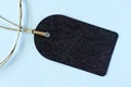 Emty black gift tag with natural jute twine