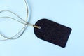 Emty black gift tag with natural jute twine