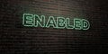ENABLED -Realistic Neon Sign on Brick Wall background - 3D rendered royalty free stock image