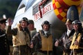 Enactors dressed in period costume to fit with the aircraft in the background.