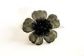 Black Grey Enamel Flower Metal Brooch Pin on the White Background
