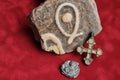 Enamelled tile from church with a stylized fish image. Small crucifix with enamels. Lead seal with a picture of the holy