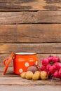 Enamelware Cup and vegetables still life.